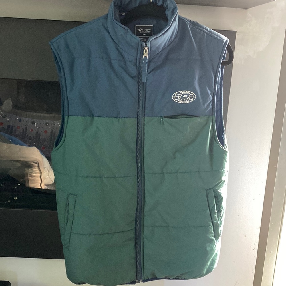 Green and blue primitive vest